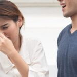 Why Does My Breath Smell Like Poop? Causes & Fixes